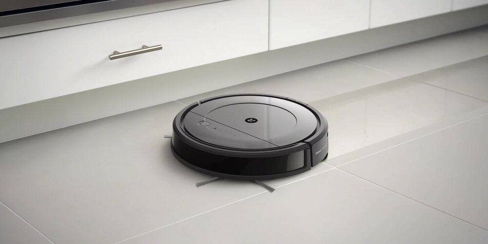Een Roomba die een vloer dweilt